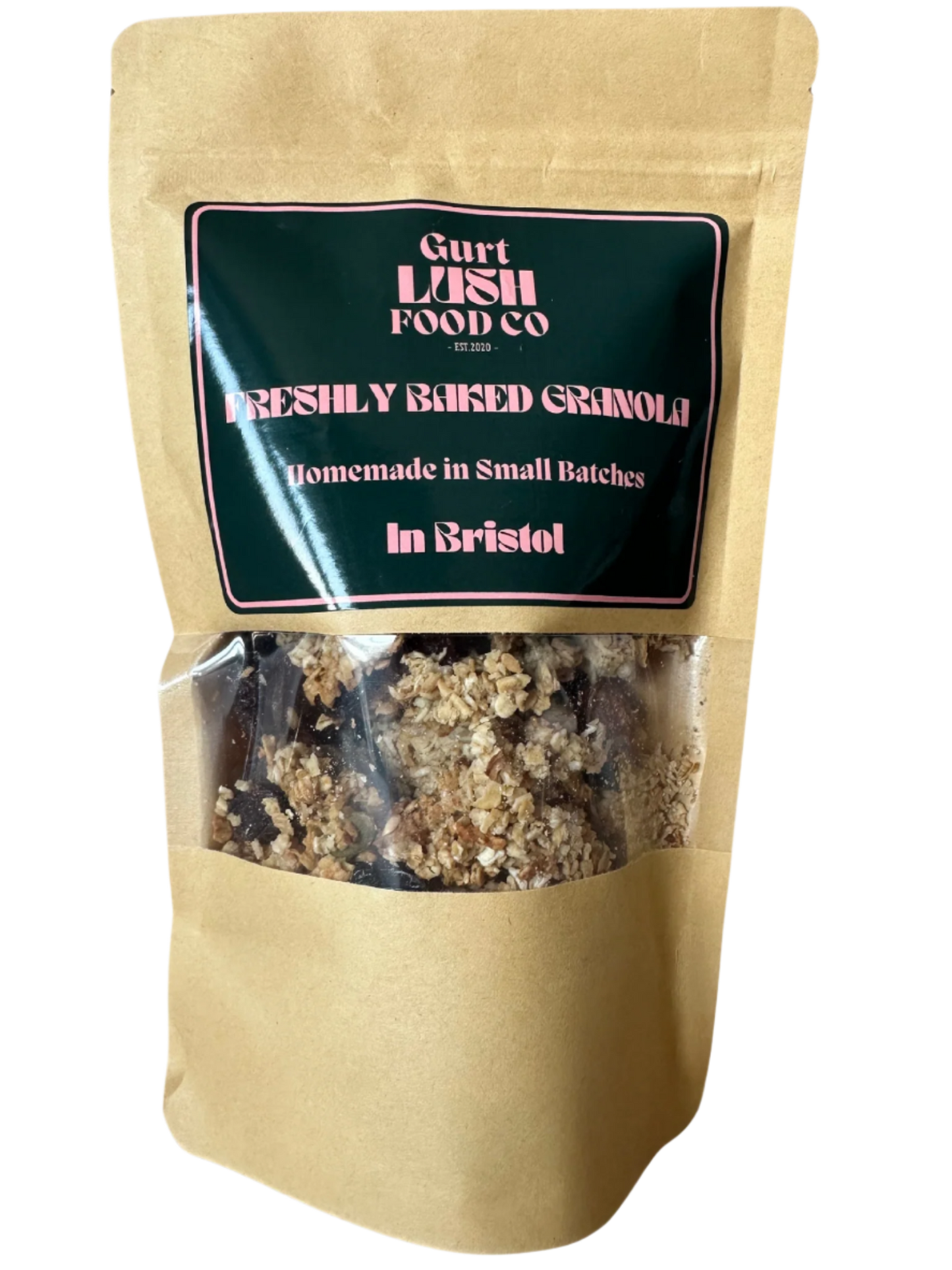 Kraft paper packaging of freshly baked granola with a label on a white background
