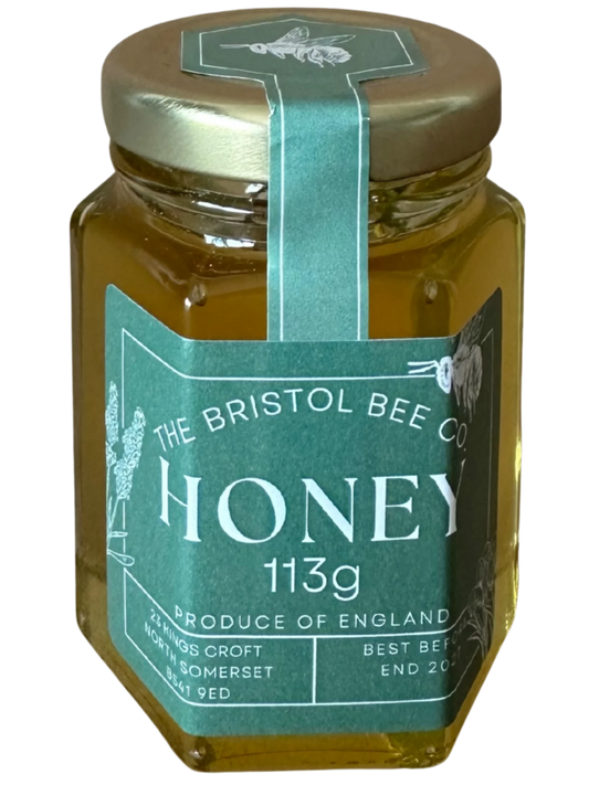 Jar of honey from The Bristol Bee Company with a green label on a white background
