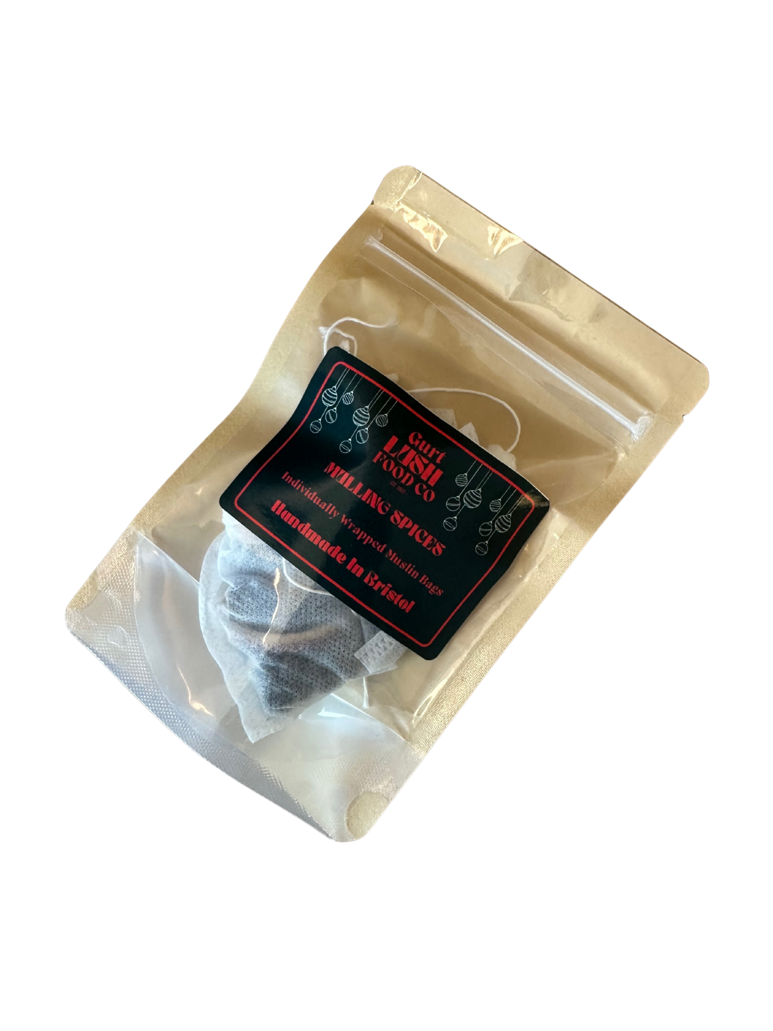 Tea bag in a clear package with a label on a white background