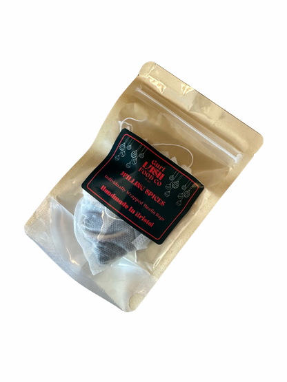 Tea bag in a clear package with a label on a white background