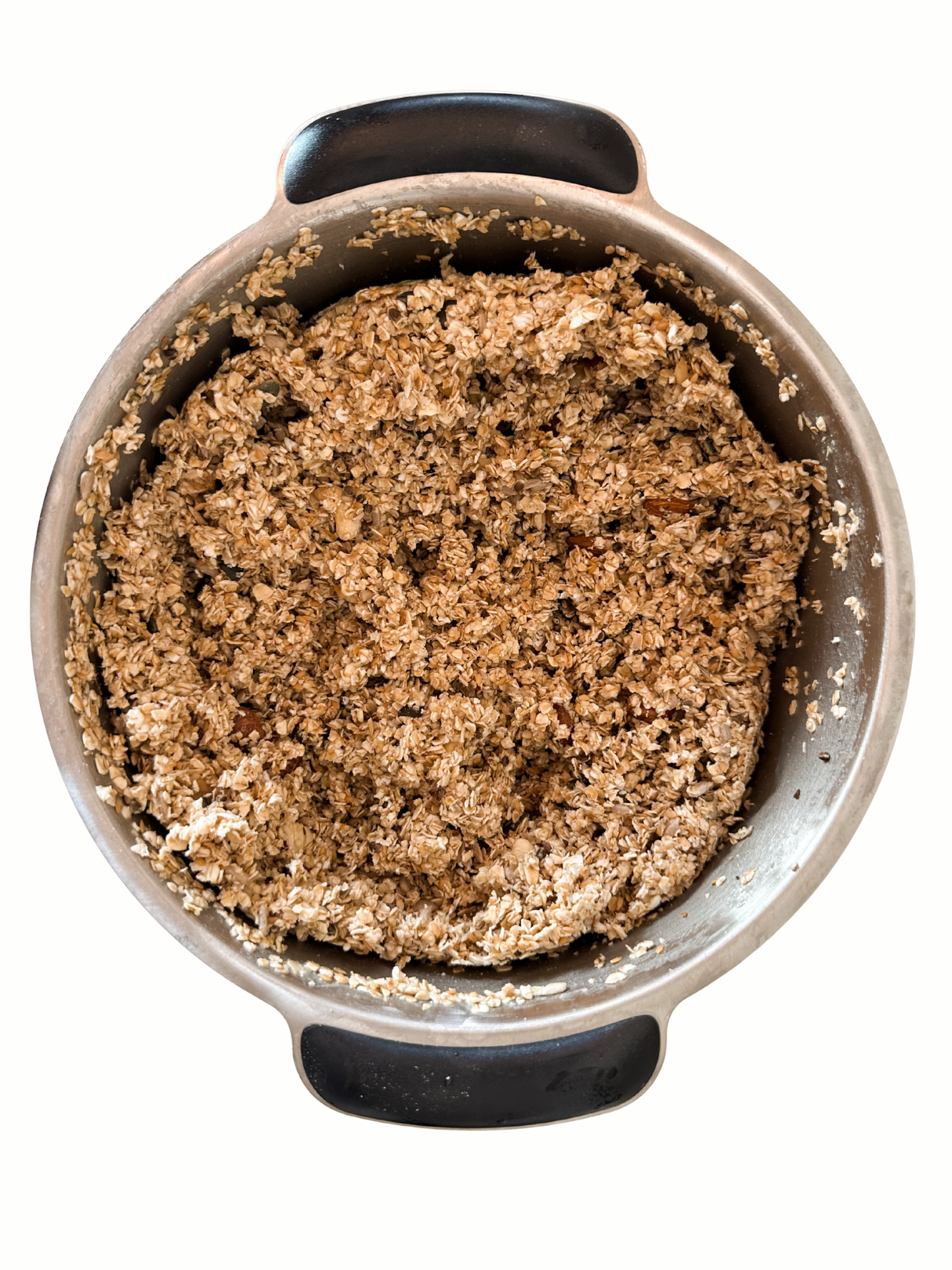 Bowl of cookie dough on a white background