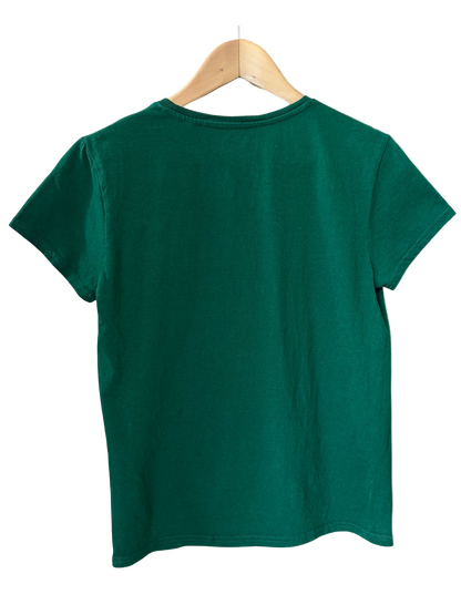 Green t-shirt on a wooden hanger against a white background