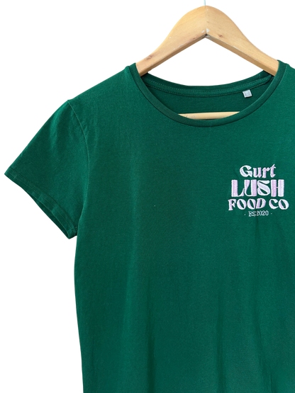 Green t-shirt with 'Gurt Lush Food Co' text on a hanger