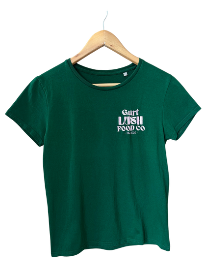 Green t-shirt with 'Surf Lush Food Co' text on a hanger against a white background