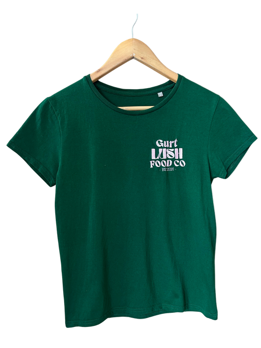 Green t-shirt with 'Surf Lush Food Co' text on a hanger against a white background